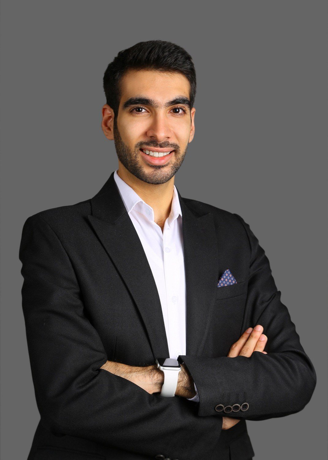 Suleiman Atieh in a black blazer and white shirt